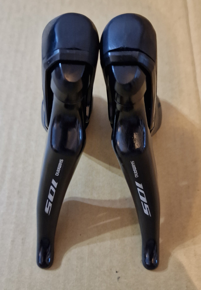 Shimano 7020 hydraulic shifters pair . Used but in excellent condition .
